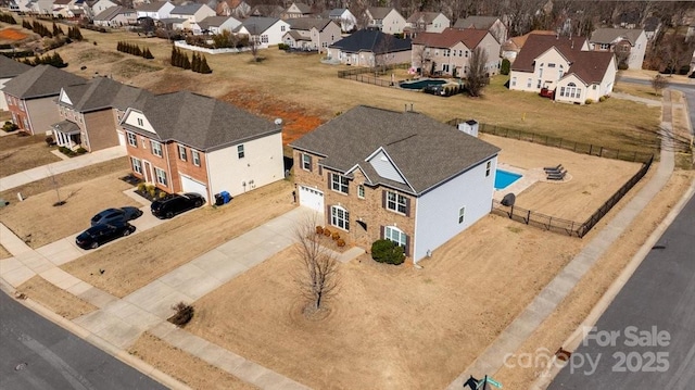 birds eye view of property featuring a residential view