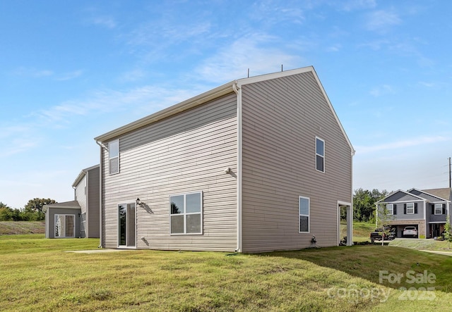 view of property exterior featuring a yard