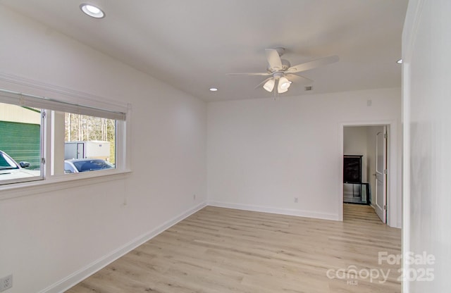 unfurnished room featuring baseboards, recessed lighting, a ceiling fan, and light wood-style floors