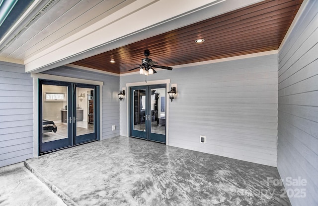 view of patio / terrace with a ceiling fan and french doors