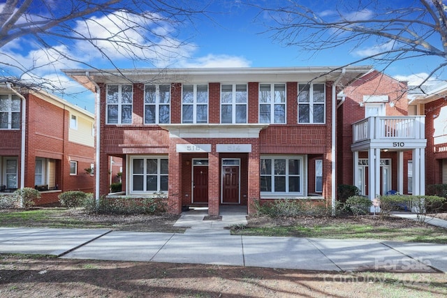 multi unit property featuring brick siding