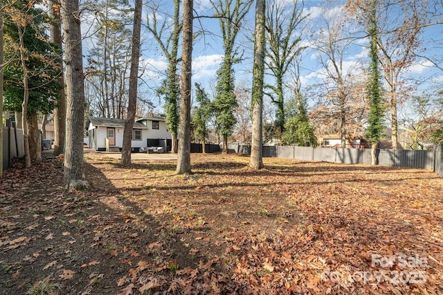 view of yard with fence