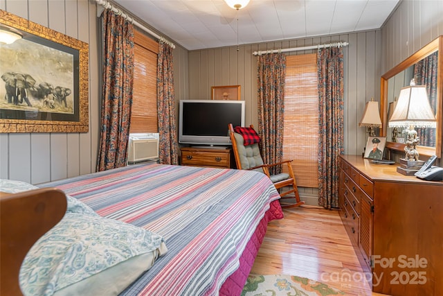 bedroom featuring light wood-style floors