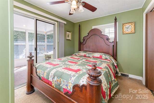 bedroom featuring visible vents, baseboards, a ceiling fan, access to exterior, and carpet floors