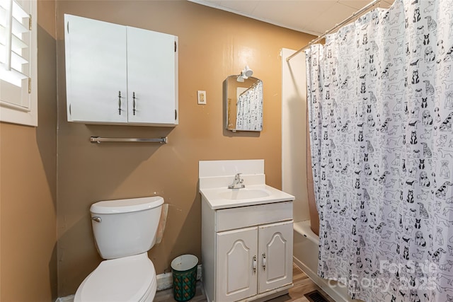 full bathroom featuring vanity, toilet, and shower / bathtub combination with curtain