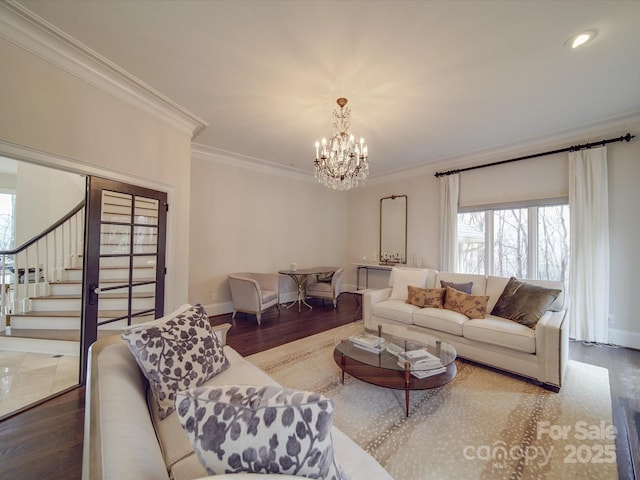 living room with crown molding, stairs, and wood finished floors