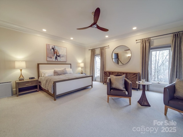 bedroom with crown molding, ceiling fan, recessed lighting, and light colored carpet