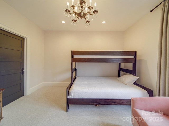 carpeted bedroom with recessed lighting, a notable chandelier, and baseboards