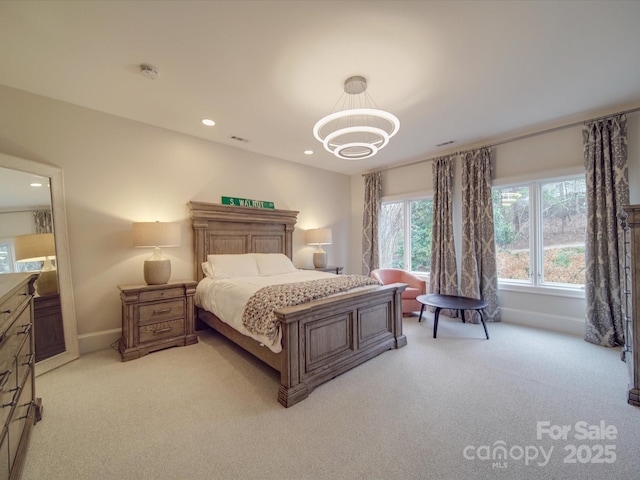 bedroom featuring recessed lighting, baseboards, and light colored carpet