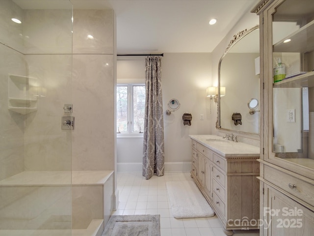 full bath with recessed lighting, vanity, a walk in shower, baseboards, and tile patterned floors