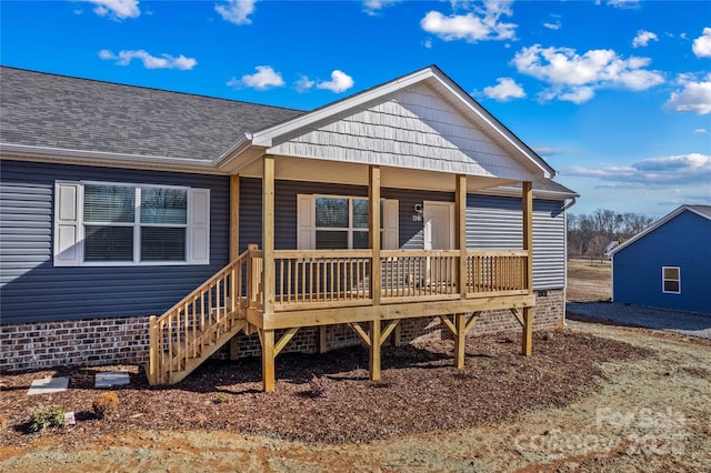 exterior space featuring covered porch