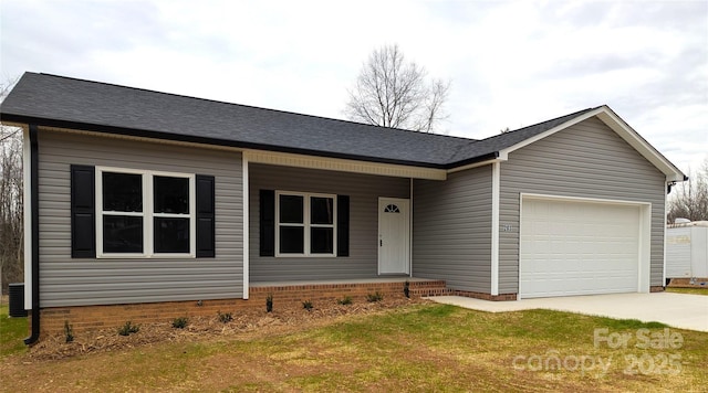 ranch-style home with a garage and a front yard