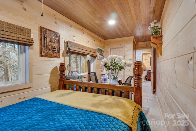 bedroom with recessed lighting, wooden ceiling, and wooden walls