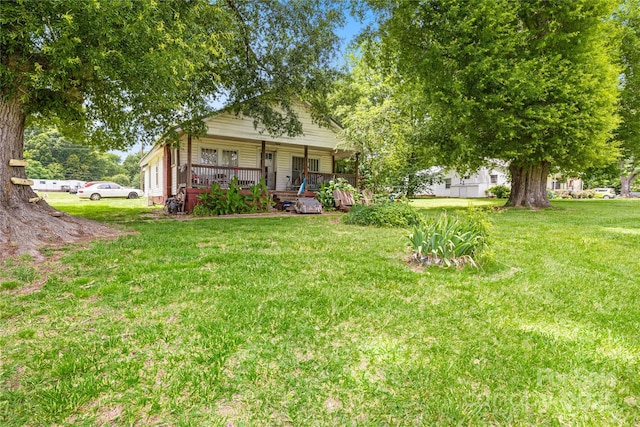 view of yard with a porch