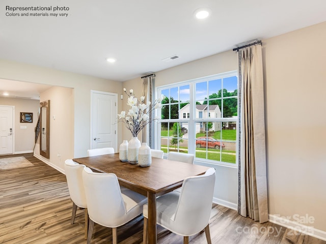 dining room with light wood-type flooring