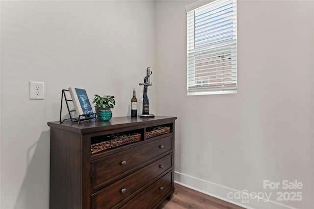 room details with wood finished floors and baseboards