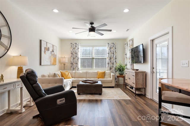 living area with ceiling fan, baseboards, dark wood-style flooring, and recessed lighting