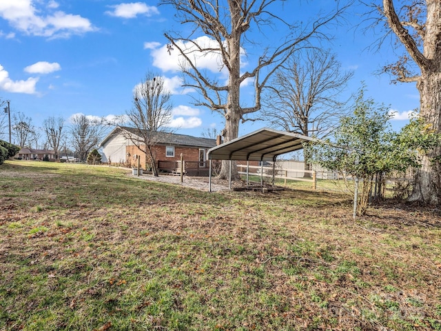 view of yard featuring a carport