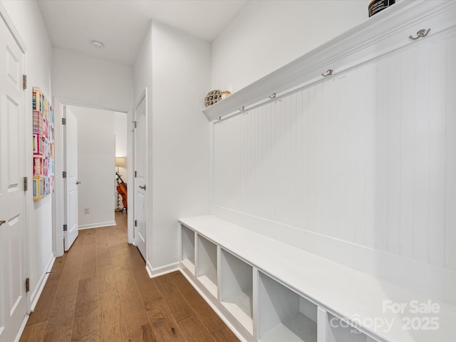 mudroom with dark wood-style flooring