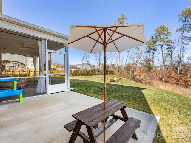 view of patio / terrace with a sunroom