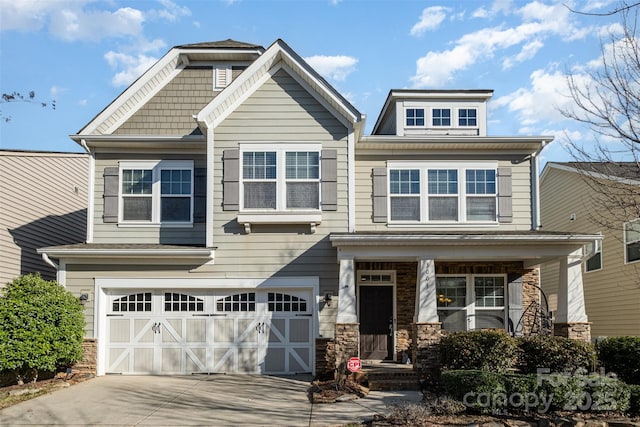 craftsman house with a garage