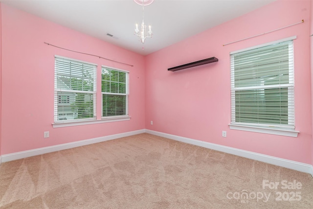 3004 Fallondale Rd, Waxhaw, NC 28173 - unfurnished room with carpet floors, a chandelier, and baseboards