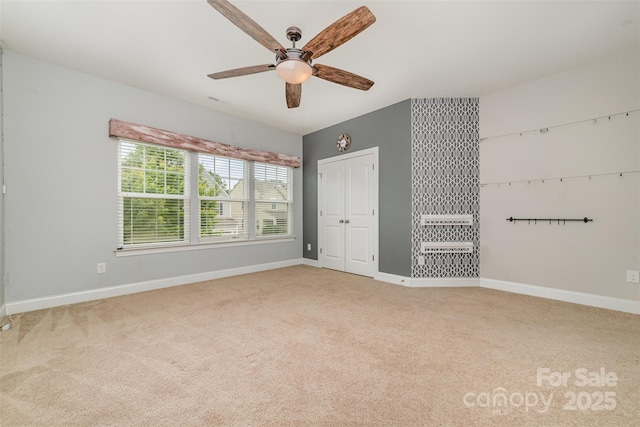 3004 Fallondale Rd, Waxhaw, NC 28173 - unfurnished bedroom with carpet floors, baseboards, a ceiling fan, and a closet