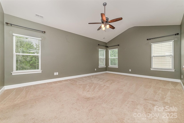 3004 Fallondale Rd, Waxhaw, NC 28173 - unfurnished room featuring ceiling fan, vaulted ceiling, baseboards, carpet flooring, and plenty of natural light