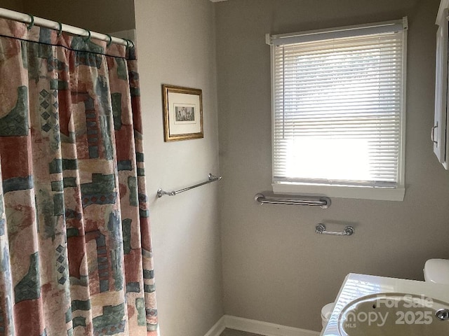 bathroom featuring vanity and a shower with curtain