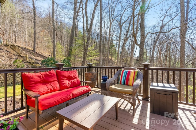 wooden deck featuring an outdoor hangout area