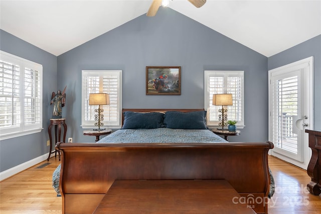 bedroom featuring lofted ceiling and light wood finished floors