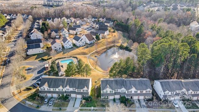 birds eye view of property with a residential view