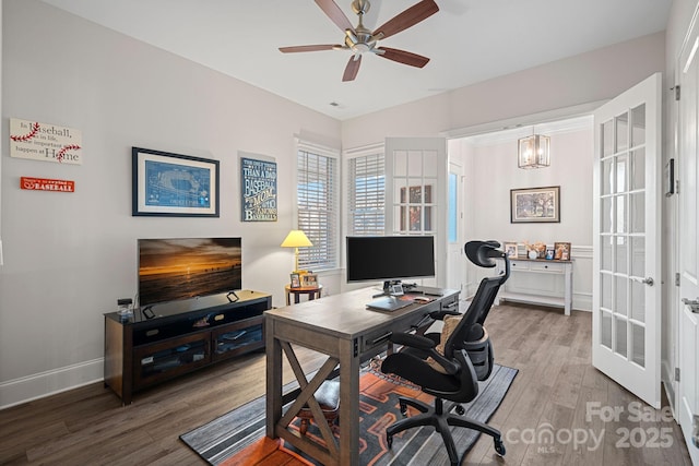 office area with ceiling fan, wood finished floors, visible vents, baseboards, and french doors