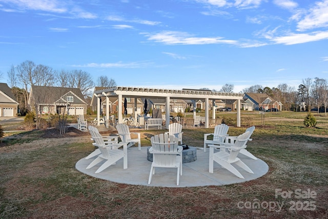 view of patio featuring an outdoor fire pit, a residential view, and a pergola