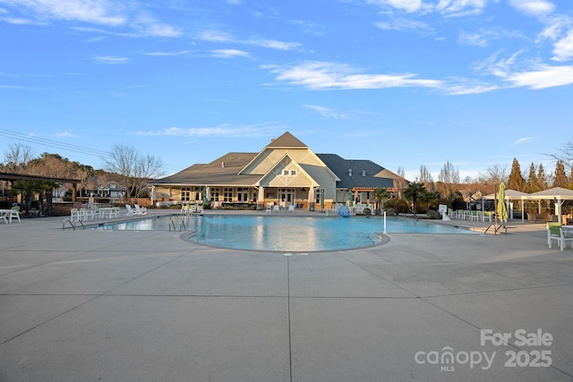 pool with a patio