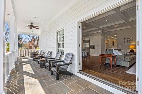 view of patio / terrace featuring a porch and ceiling fan