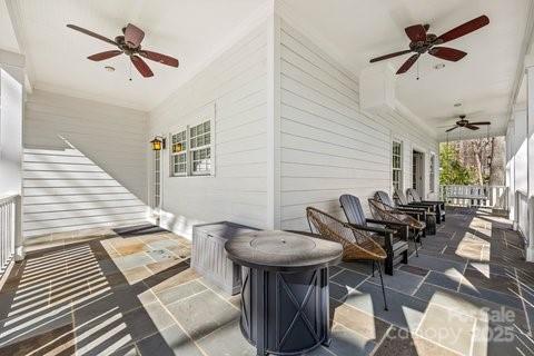 view of patio / terrace featuring ceiling fan