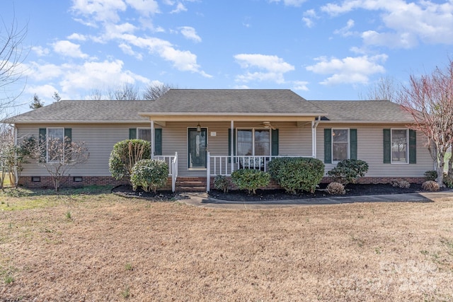 ranch-style home with covered porch, a shingled roof, crawl space, and a front yard