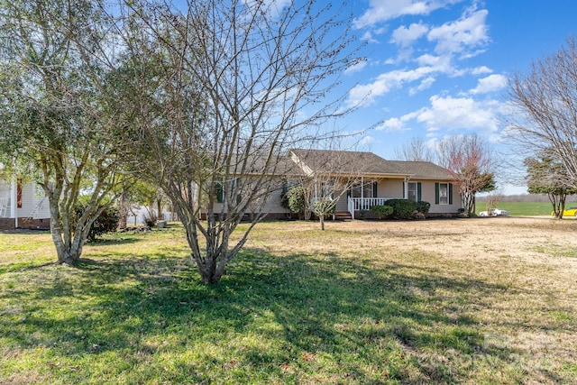 single story home featuring crawl space, a porch, and a front lawn