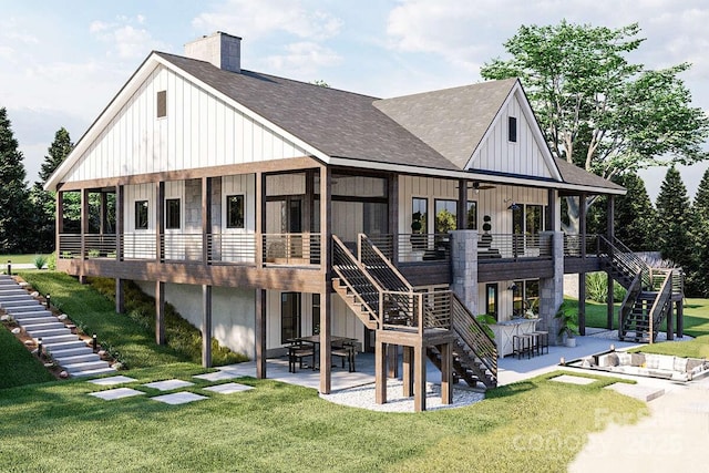 back of house featuring stairs, a lawn, board and batten siding, and a patio