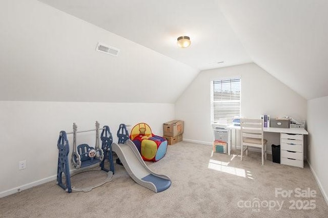 game room with lofted ceiling, carpet, visible vents, and baseboards