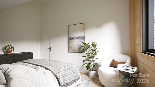 bedroom featuring hardwood / wood-style flooring