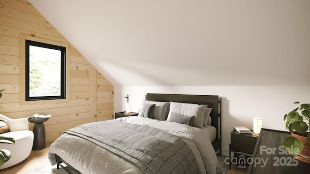 bedroom featuring lofted ceiling, hardwood / wood-style floors, and wood walls