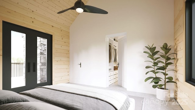 carpeted bedroom with high vaulted ceiling, ceiling fan, and access to exterior