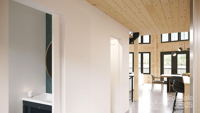 hall featuring wood ceiling and french doors