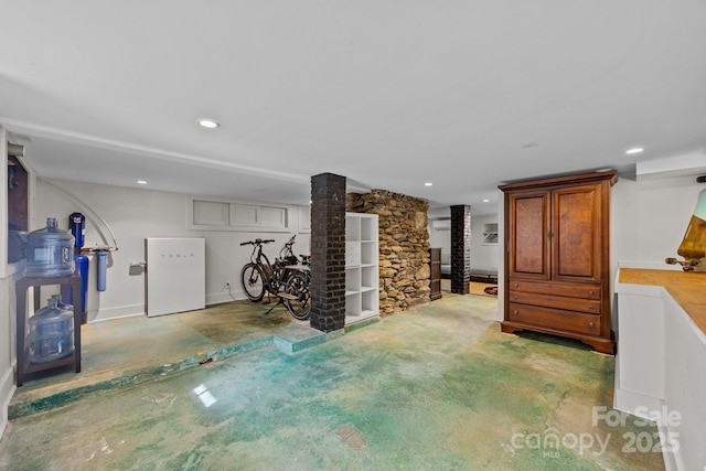 finished basement featuring recessed lighting