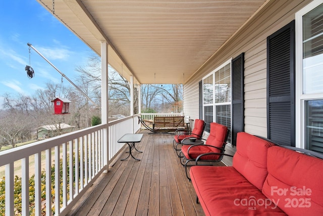 deck with covered porch