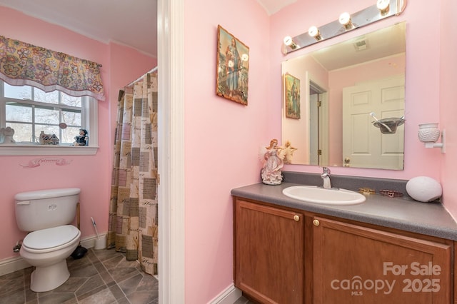 full bath with baseboards, toilet, a shower with curtain, tile patterned floors, and vanity