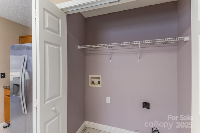 laundry area with laundry area, baseboards, washer hookup, and hookup for an electric dryer