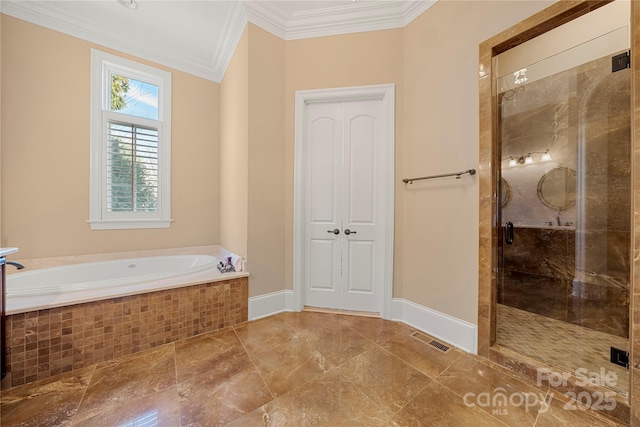 full bathroom featuring visible vents, baseboards, ornamental molding, a bath, and a stall shower